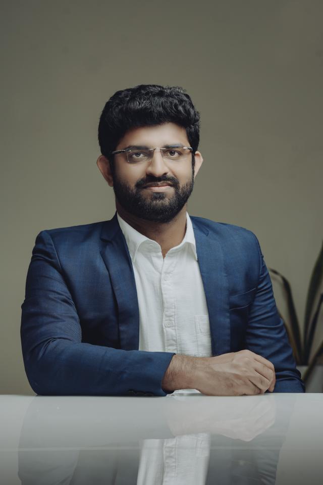 Adarsha K.